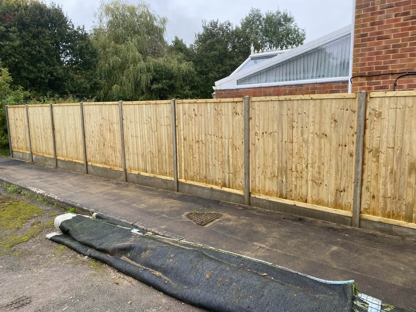 Tongue and groove fence panels fitted in Haslemere